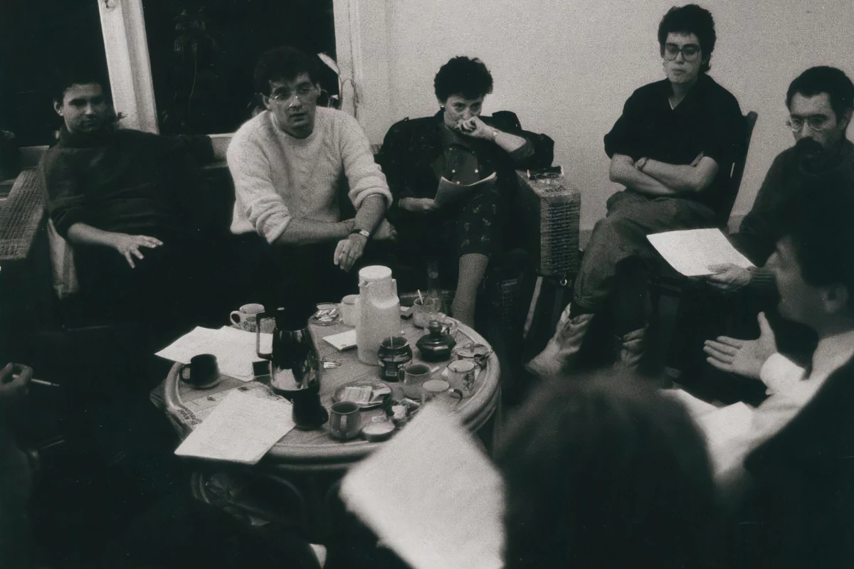 Contact us team image - 80s image of a team meeting