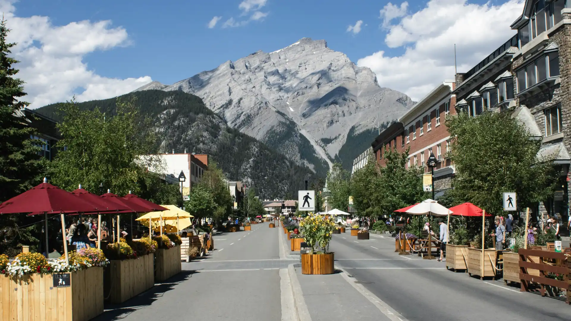 Road leading through a mountain town representing the journey of a creative agency in Essex helping businesses grow